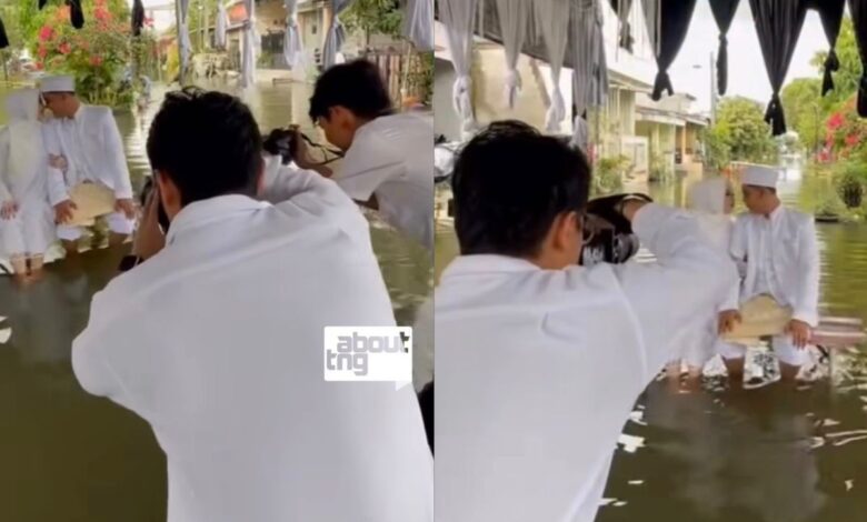 Biar banjir, gambar kahwin kena ada