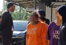 Isteri suspek ditembak mati direman, polis rampas pistol
