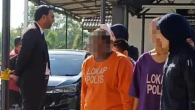 Isteri suspek ditembak mati direman, polis rampas pistol