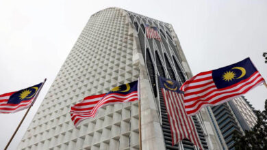 DAP leaders urge forgiveness, Umno Youth demands 'stern action' over flag incident