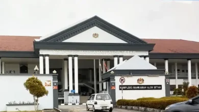 4 charged with killing policeman in Kedah