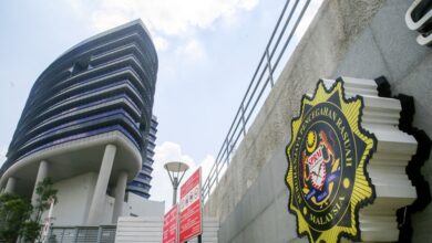 The Malaysian Anti-Corruption Commission remanded a former chief executive officer of a banking institution-owned foundation and the chairman of a non-governmental organisation for five days until August 31 for allegedly being involved in false claims amounting to over RM2.1 million. — Picture by Choo Choy May