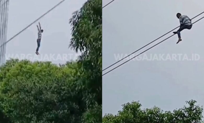 Tak cukup duit balik kampung, lelaki bertenggek atas kabel elektrik