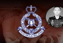 Driver who fled after hitting policeman arrested