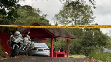 Kuching Chinese cemetery turns crime scene as father killed, son left critical