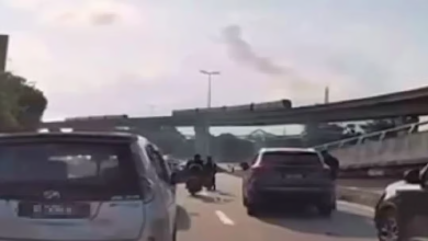 Cops hunt driver who crashed after weaving through LDP traffic