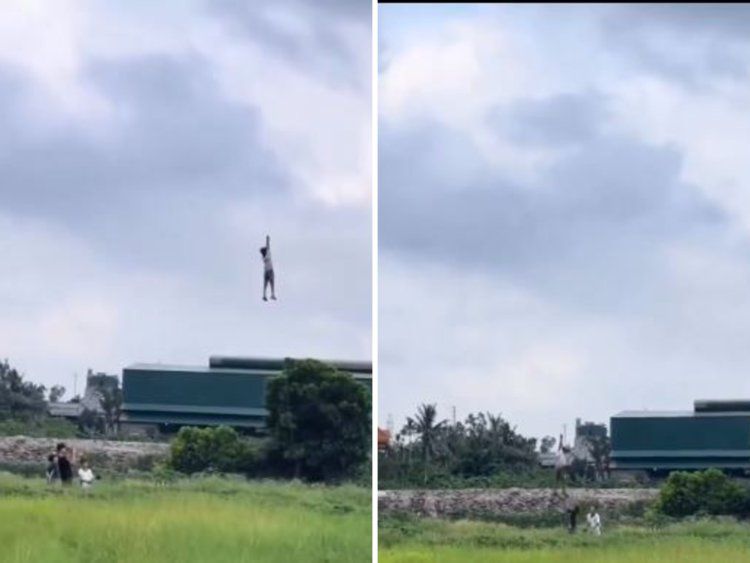 Budak terbang bersama layang-layang