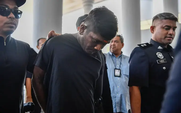 Parking attendant claims trial to possessing fake gun, criminal intimidation