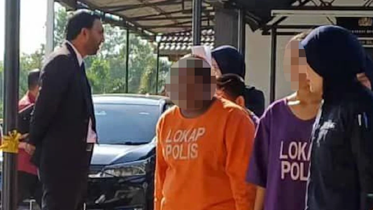 Isteri suspek ditembak mati direman, polis rampas pistol