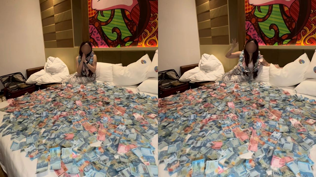 Nathalie menayangkan wang kertas yang diterima selepas membuat persembahan di sebuah kelab malam. - Instagram