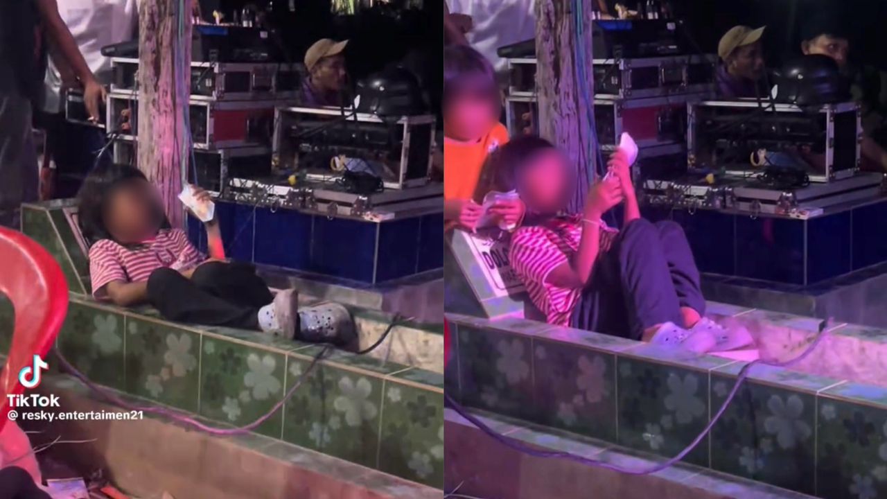 Gadis baring atas kubur tonton konsert