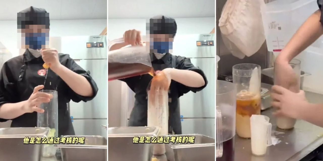 Pekerja kedai teh celup tangan kacau minuman