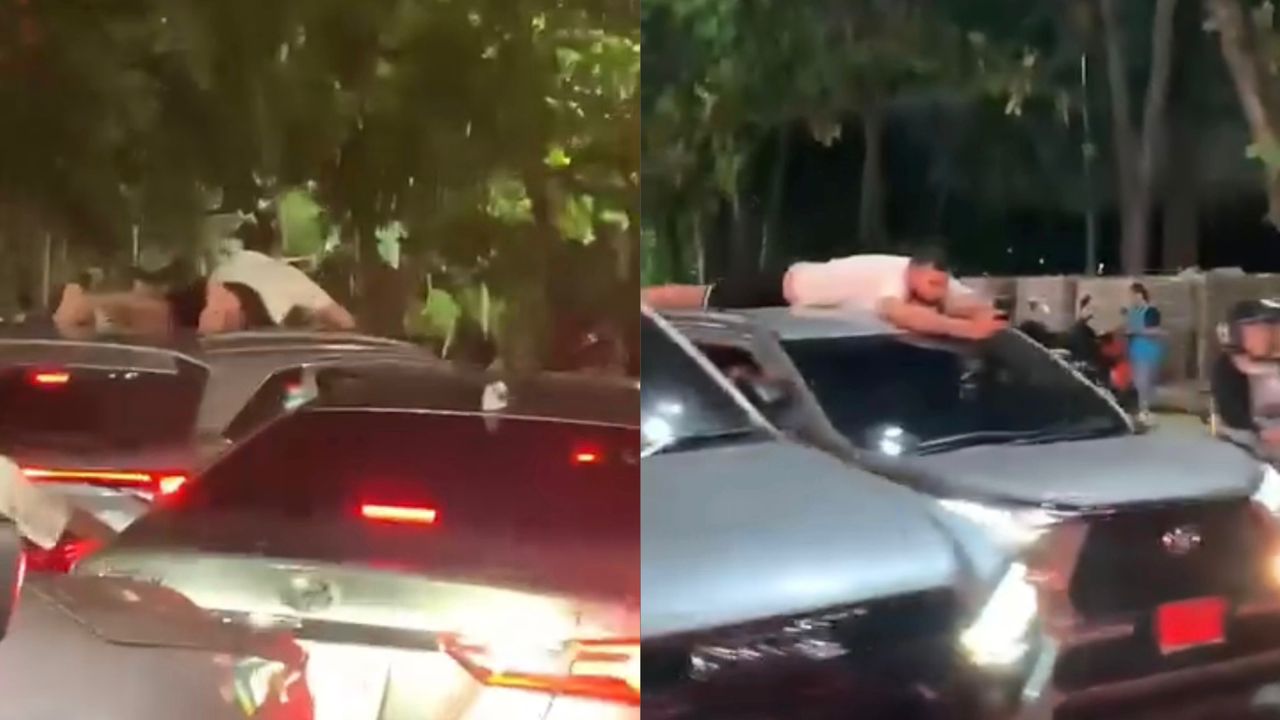 Bosan jalan jem, pelancong meniarap atas SUV 