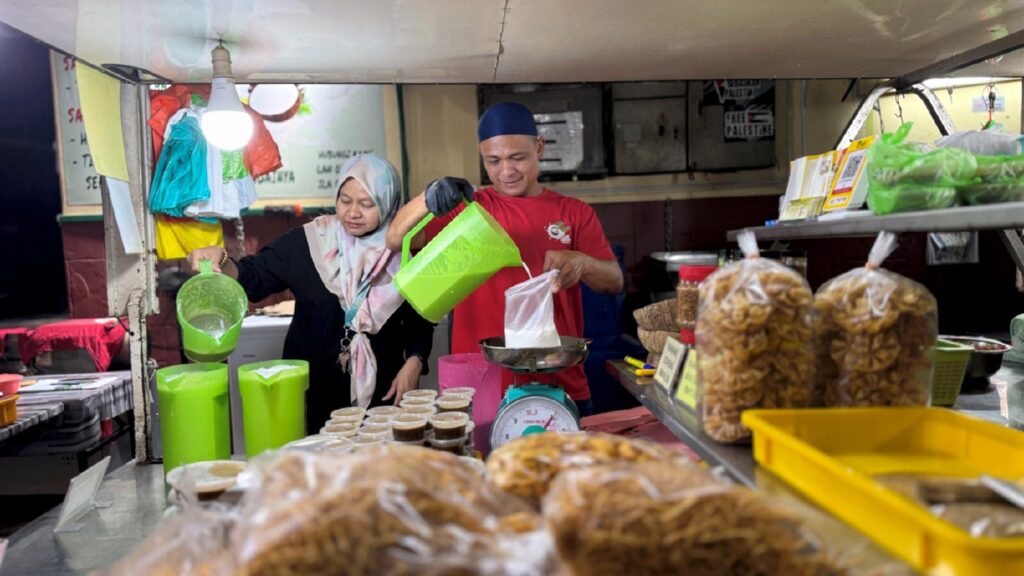 Cracking demand: Santan trader hits 10,000 coconuts a day ahead of festivities