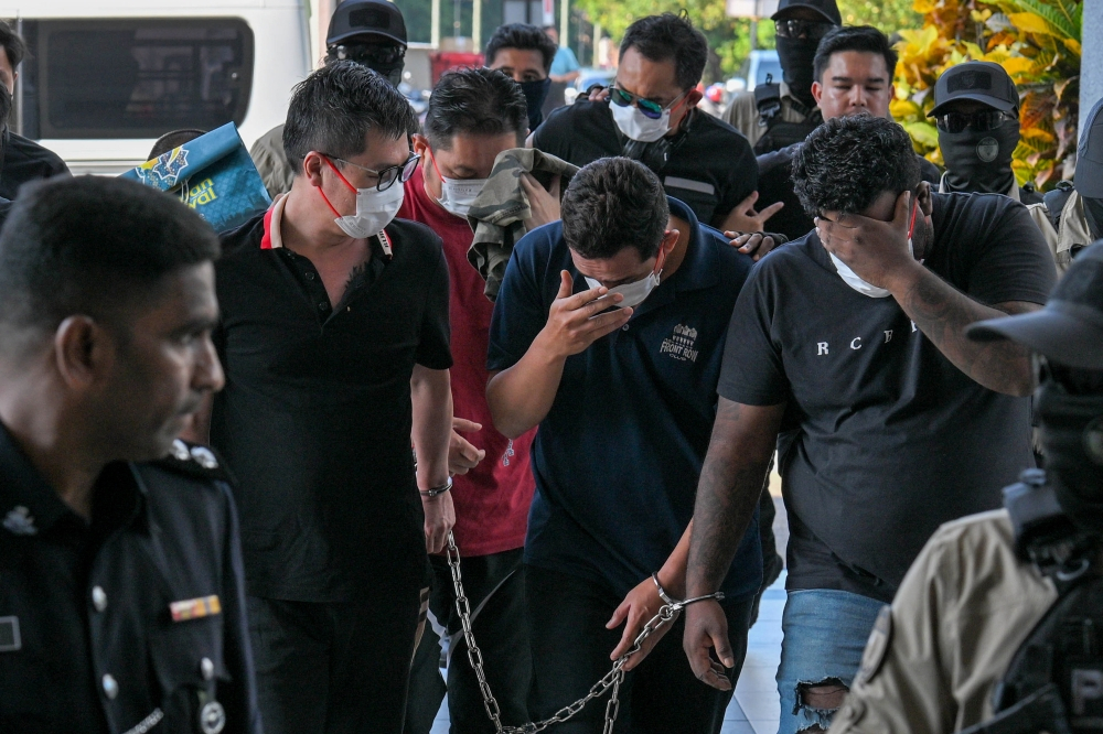 Police officer among six charged over RM4.4m gang robberies in Kepong homes, pleads not guilty