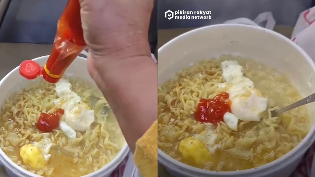 Wanita selamba masak mi segera dalam kereta api