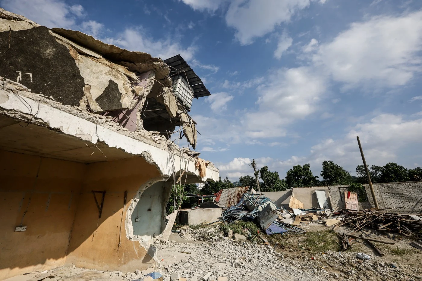 Rohingya say landowner built and offered illegal flats in Sungai Tekali