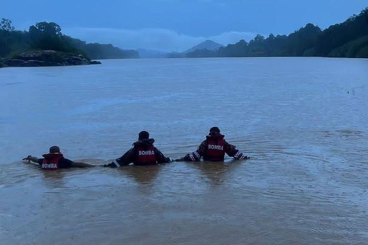 Two 14-year-old boys feared drowned while swimming in river